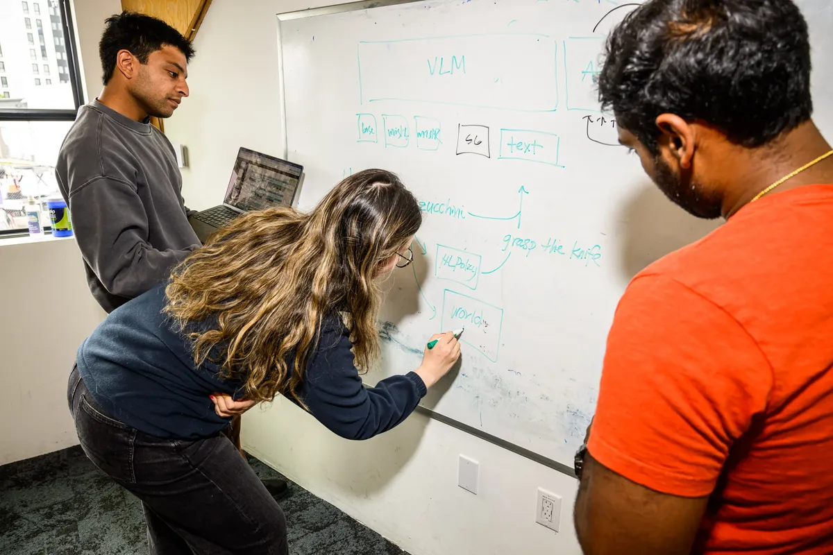 How do you teach a robot to use a knife? At the startup Physical Intelligence, it begins with designing the right AI architecture, which includes components dedicated to language, vision and motion. This will help it relate commands — “hey 